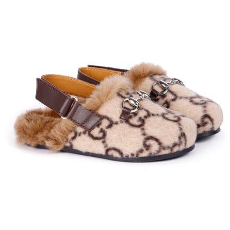 gucci fur slippers fake|gucci female slippers.